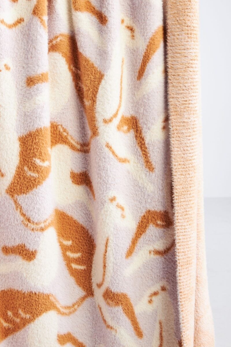 Galleria foto 'Anthropologie: 8 meravigliosi Plaid per scaldare con stile le tue sere di Dicembre!' - foto 8