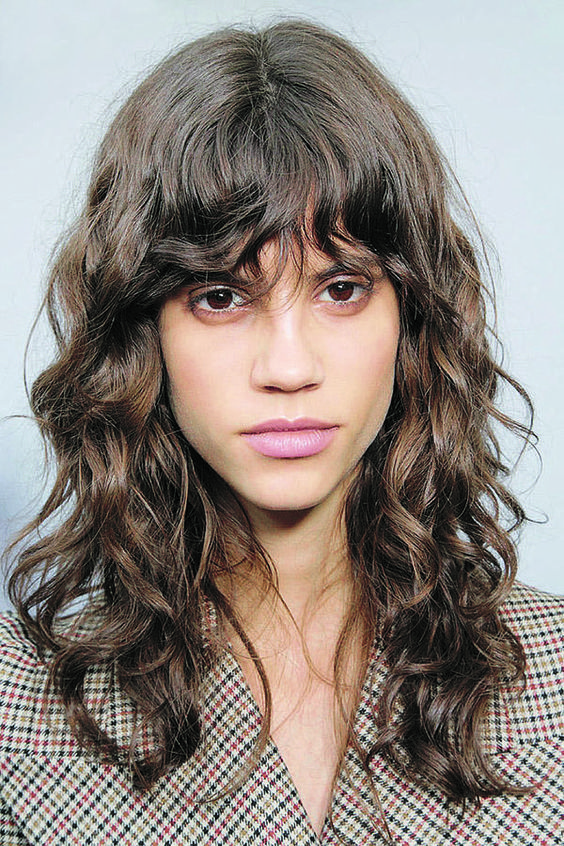 Capelli ricci lunghi con frangetta tagli ricci 2018